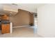 Open living area features an eat-in kitchen with stainless appliances and tall ceilings with natural light at 6262 142Nd N Ave # 607, Clearwater, FL 33760