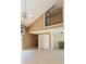 Bright and airy living room with vaulted ceilings, neutral colors, and sliding door access to outdoor space at 6262 142Nd N Ave # 607, Clearwater, FL 33760