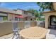Private patio with outdoor seating and view of manicured landscaping at 6262 142Nd N Ave # 607, Clearwater, FL 33760
