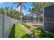The gorgeous screened-in pool and patio offer a private oasis for relaxation and entertainment at 627 Belted Kingfisher N Dr, Palm Harbor, FL 34683