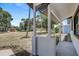 Inviting front porch featuring classic columns and views of the neighborhood at 6347 S Lansdale Cir, Tampa, FL 33616