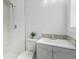 Bathroom featuring a modern vanity and shower, offering a clean and contemporary design at 7110 Bonito St, Tampa, FL 33617