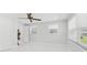 Bright bedroom featuring ample natural light and white paint at 7110 Bonito St, Tampa, FL 33617