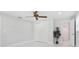 Bedroom featuring an ensuite bathroom and ample closet space at 7110 Bonito St, Tampa, FL 33617