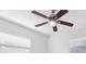 An elegant ceiling fan with decorative blades and a stylish light fixture enhances the room's ambiance at 7110 Bonito St, Tampa, FL 33617