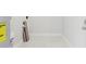 Clean laundry room with modern flooring, ready for appliances, and ample space for organization at 7110 Bonito St, Tampa, FL 33617