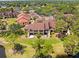 Aerial view of the property, showcasing the community, landscaping, and surrounding greenery at 8103 Bardmoor Pl # 203G, Seminole, FL 33777