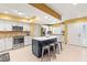 Spacious kitchen featuring stainless steel appliances, a center island, and ample cabinet space at 8103 Bardmoor Pl # 203G, Seminole, FL 33777