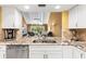 Kitchen sink with granite counters and stainless steel appliances at 8103 Bardmoor Pl # 203G, Seminole, FL 33777