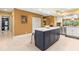 Bright kitchen with an island and stainless steel appliances at 8103 Bardmoor Pl # 203G, Seminole, FL 33777