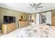 Bedroom featuring neutral walls, tile flooring, and TV at 8103 Bardmoor Pl # 203G, Seminole, FL 33777