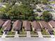 A beautiful aerial view showcases a well-planned neighborhood with lush greenery and well-maintained homes at 9200 Halberg Dr, Hudson, FL 34669