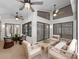 Spacious Florida room is perfect for entertaining, with lots of ceiling fans and natural light at 9200 Halberg Dr, Hudson, FL 34669