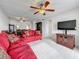 Spacious living room seamlessly connects to the dining area, offering a comfortable and inviting living space at 1 Boca Ciega Point Blvd # 215, St Petersburg, FL 33708