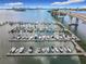 Picturesque marina with multiple boats docked and a beautiful bridge in the distance on a sunny day at 100 Pierce St # 910, Clearwater, FL 33756
