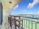 Spacious tiled balcony with bar-height seating overlooking the marina and the city skyline at 100 Pierce St # 910, Clearwater, FL 33756
