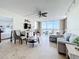 Bright living room with view of the water, comfortable seating, and stylish décor provides a relaxing atmosphere at 100 Pierce St # 910, Clearwater, FL 33756