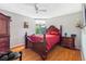View of the bedroom with furnishings and window with natural light at 1024 Dockside Dr, Lutz, FL 33559