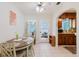 Cozy dining area adjacent to kitchen with stylish table and chairs at 103 N Meteor Ave, Clearwater, FL 33765