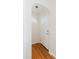Bright entryway featuring hardwood floors and a classic white door at 103 N Meteor Ave, Clearwater, FL 33765