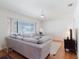 Bright living room features a large sectional and view to the exterior at 103 N Meteor Ave, Clearwater, FL 33765