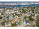 An aerial view of a neighborhood near a water channel with boats and port facilities at 111 Chesapeake Ave, Tampa, FL 33606