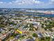Beautiful aerial view showcasing the home's location, nestled among lush greenery, with city views and access to the water at 111 Chesapeake Ave, Tampa, FL 33606
