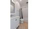 A modern bathroom featuring bright white cabinets, tile, and updated fixtures at 111 Chesapeake Ave, Tampa, FL 33606