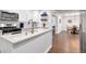Modern kitchen features quartz counters, new appliances, and tile backsplash at 111 Chesapeake Ave, Tampa, FL 33606