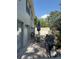 Outdoor patio area with table, chairs, an umbrella and a BBQ grill at 11764 Raintree Dr # 0, Temple Terrace, FL 33617