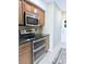 Modern kitchen featuring stainless steel appliances and sleek countertops at 11764 Raintree Dr # 0, Temple Terrace, FL 33617