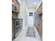 Modern kitchen with stainless steel appliances and wooden cabinets at 11764 Raintree Dr # 0, Temple Terrace, FL 33617