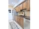 Well-appointed kitchen featuring stainless steel appliances, granite countertops, and ample cabinetry at 11764 Raintree Dr # 0, Temple Terrace, FL 33617