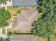 Aerial view highlighting the roof condition, landscaping, and proximity to neighboring homes at 11808 Holly Crest Ln, Riverview, FL 33569