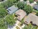 Overhead view showing the location in the community of the house which has a well-maintained lawn and landscaping at 11808 Holly Crest Ln, Riverview, FL 33569