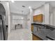Bright kitchen with granite countertops, stainless steel appliances, and a breakfast nook at 11808 Holly Crest Ln, Riverview, FL 33569