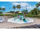 Community splash pad area with colorful slide and water features, perfect for hot days at 11808 Holly Crest Ln, Riverview, FL 33569
