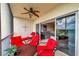 Relaxing outdoor balcony featuring comfortable seating and a ceiling fan, perfect for enjoying the tranquil views at 1200 Country Club Dr # 6302, Largo, FL 33771
