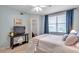 Comfortable bedroom with natural light and a view of the outside at 1200 Country Club Dr # 6302, Largo, FL 33771