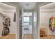 View of two well-organized walk-in closets with custom shelving and rods, leading to the bedroom at 1200 Country Club Dr # 6302, Largo, FL 33771