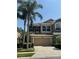 Charming two-story home with a two-car garage and lush landscaping at 12631 Silverdale St, Tampa, FL 33626