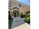 Inviting front entrance with a covered porch and well-maintained landscaping at 12631 Silverdale St, Tampa, FL 33626