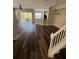 Spacious living room with hardwood floors and sliding glass doors to the patio at 12631 Silverdale St, Tampa, FL 33626