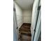 Walk-in closet with custom shelving and hardwood floors at 12631 Silverdale St, Tampa, FL 33626