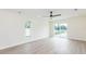 Bedroom with a window, ceiling fan, and sliding glass door at 12910 Longcrest Dr, Riverview, FL 33579