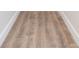 Close up of the attractive light-wood look flooring at 12910 Longcrest Dr, Riverview, FL 33579