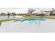 Refreshing backyard pool with lakeside view and decorative tile at 12910 Longcrest Dr, Riverview, FL 33579