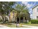 Charming two-story home featuring a lovely porch and well-maintained lawn at 13421 Lake Monroe Pl, Riverview, FL 33579