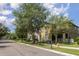 Beautiful two-story home on a quiet street, with mature landscaping at 13421 Lake Monroe Pl, Riverview, FL 33579