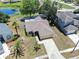 Aerial view shows cozy single Gathering home with pond access at 13437 Beechberry Dr, Riverview, FL 33579